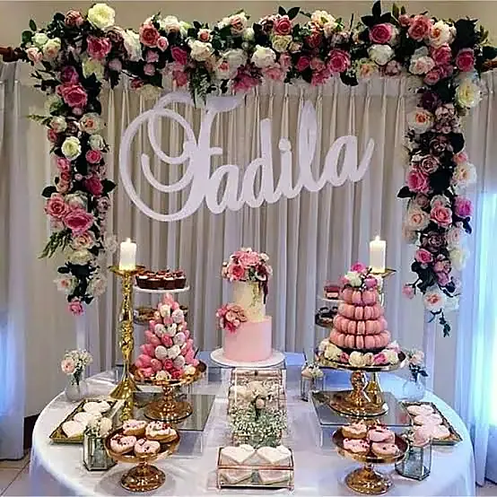 Mesa de postres de Odeo meseros en Sahagun City